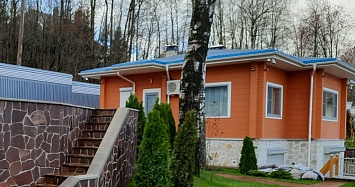 Проект Комбинированный дом на участке с большим уклоном